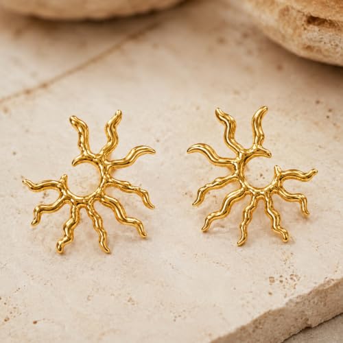 Sunburst studs resting on a weathered travertine surface