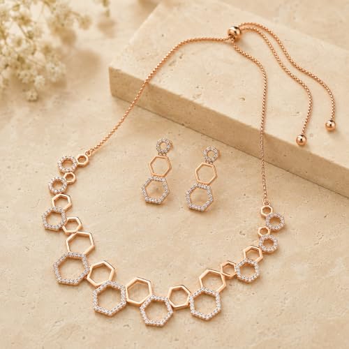 Hexa crystal necklace set arranged on travertine with dried gypsophila